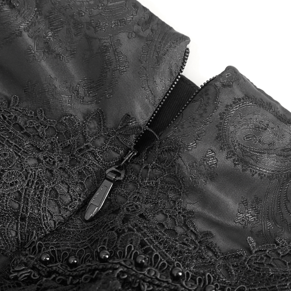 Close-up of the elegant Gothic Victorian lace skirt showcasing its intricate black lace and zipper detail.