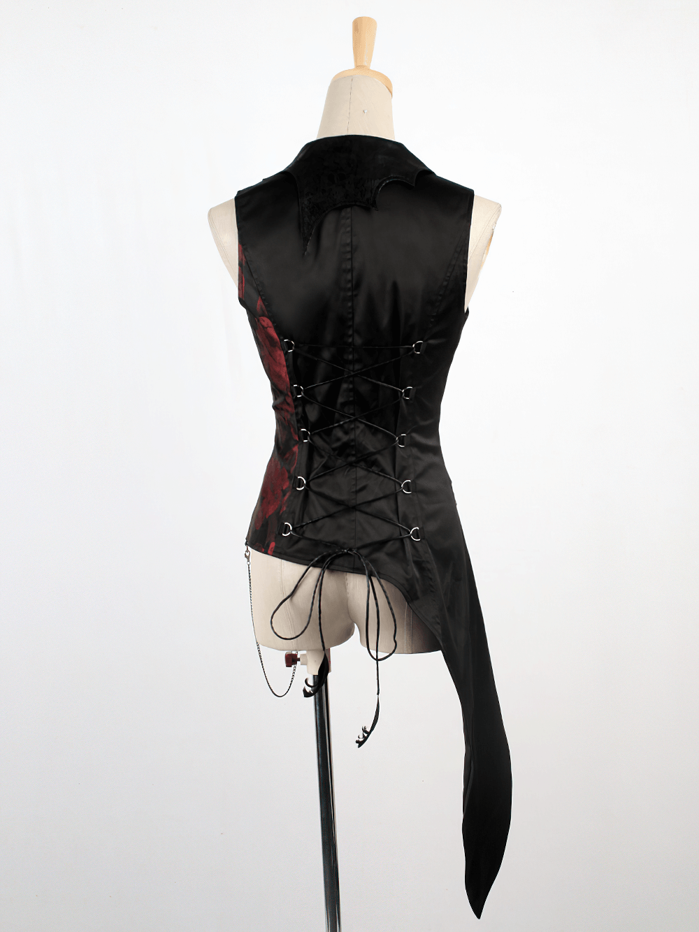Back view of an elegant Gothic women's asymmetrical black-red waistcoat with lace-up detail.