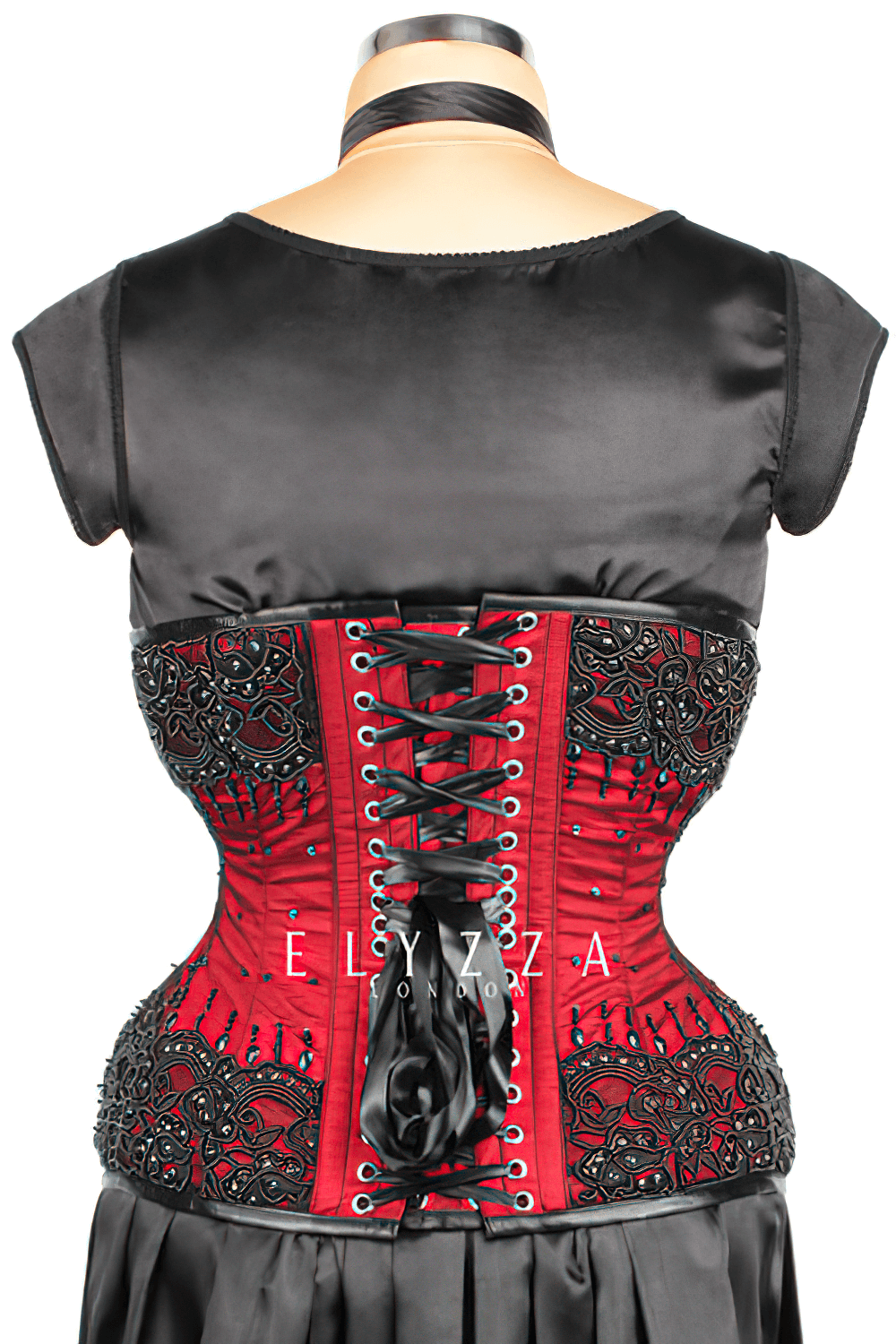 Elegant handcrafted red waist training corset with intricate beadwork and lace details, perfect for gothic fashion.