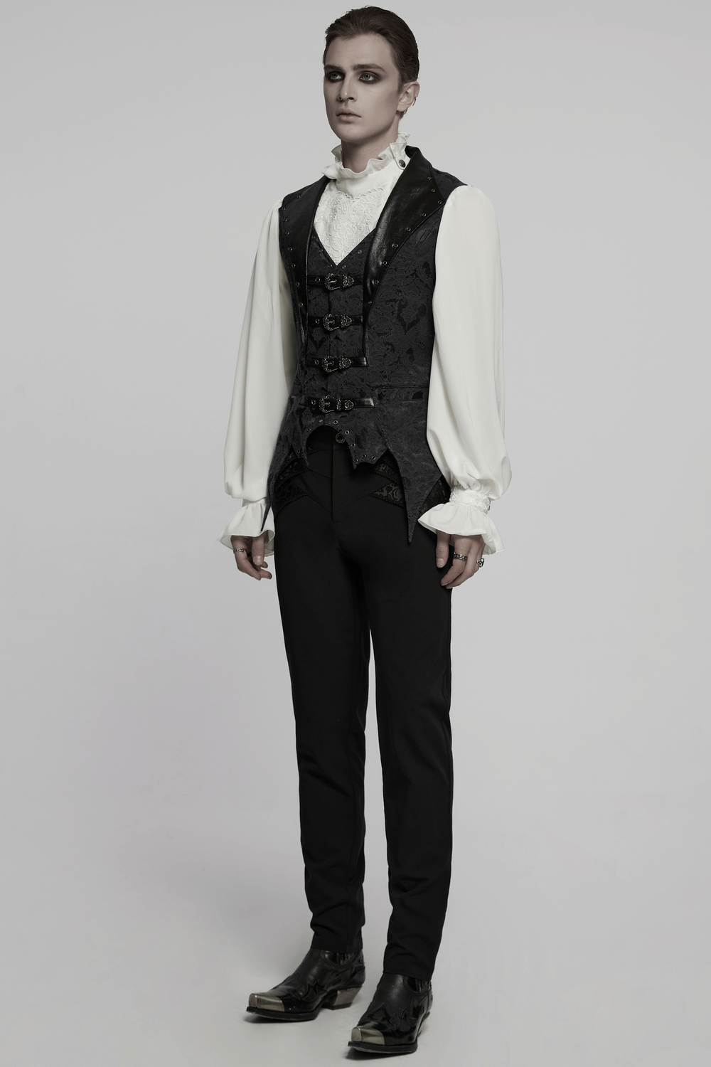 Elegant gothic jacquard waistcoat with buckles, bat hem, and textured leather for a stylish dark attire.