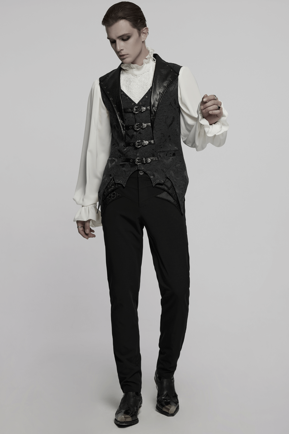 Elegant gothic jacquard waistcoat with leather, buckles, and bat hem design, perfect for steampunk fashion.