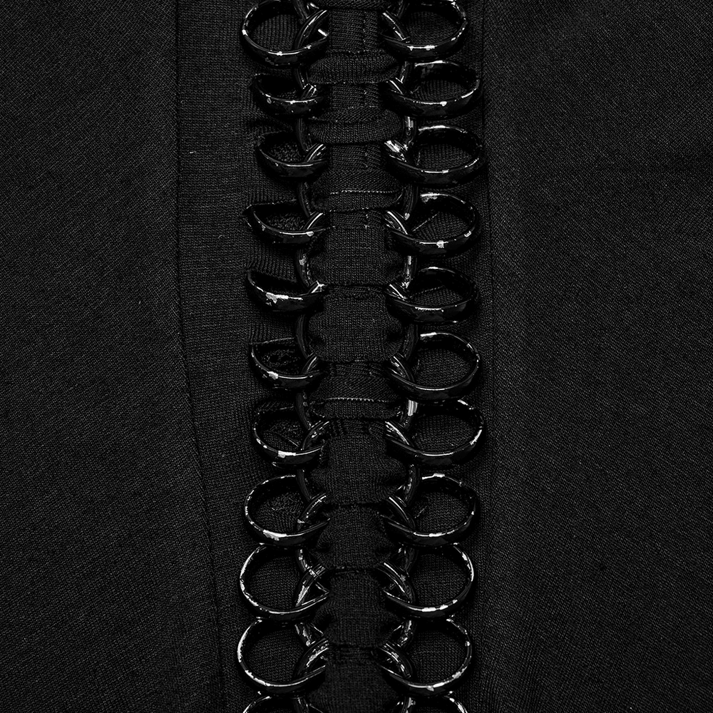 Close-up of black fabric featuring a row of woven iron chains, perfect for adding gothic flair to any outfit.