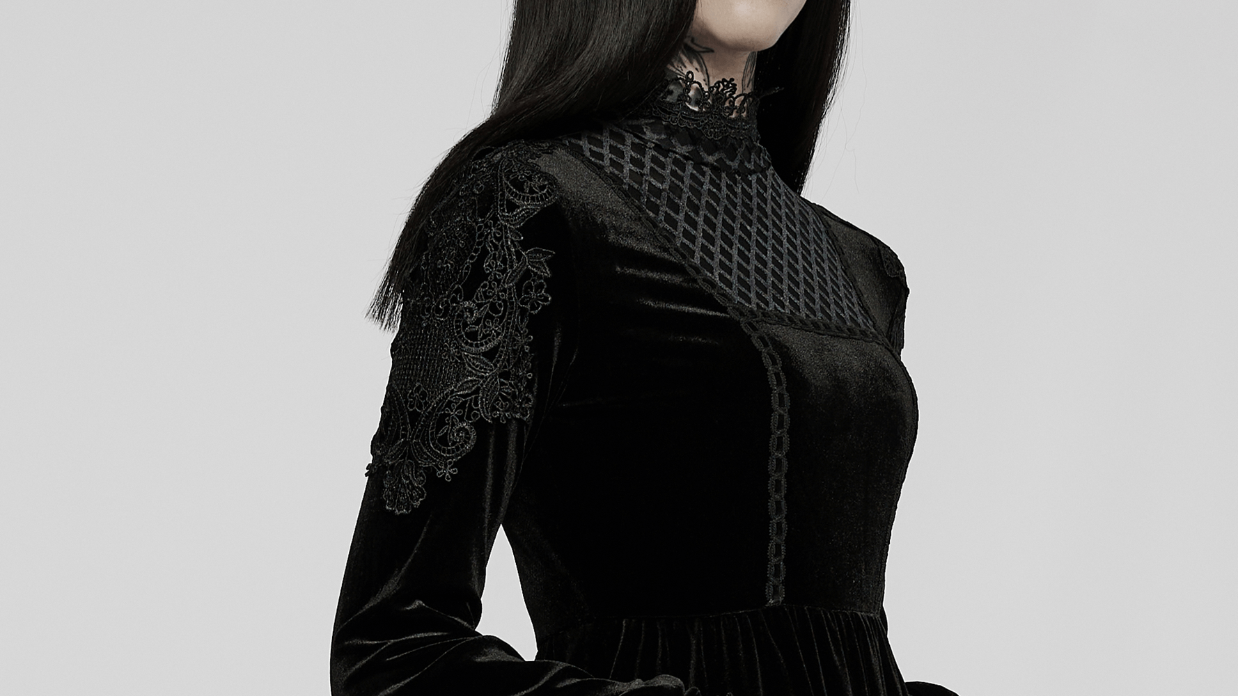 Elegant gothic velvet dress with lace collar and intricate appliques, showcasing luxurious textures and stylish design.
