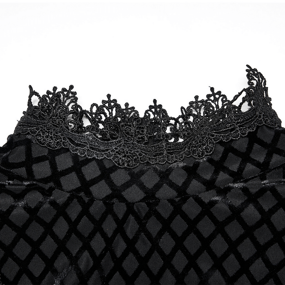 Elegant lace collar detail on a velvet gothic dress showcasing intricate designs and luxurious texture.