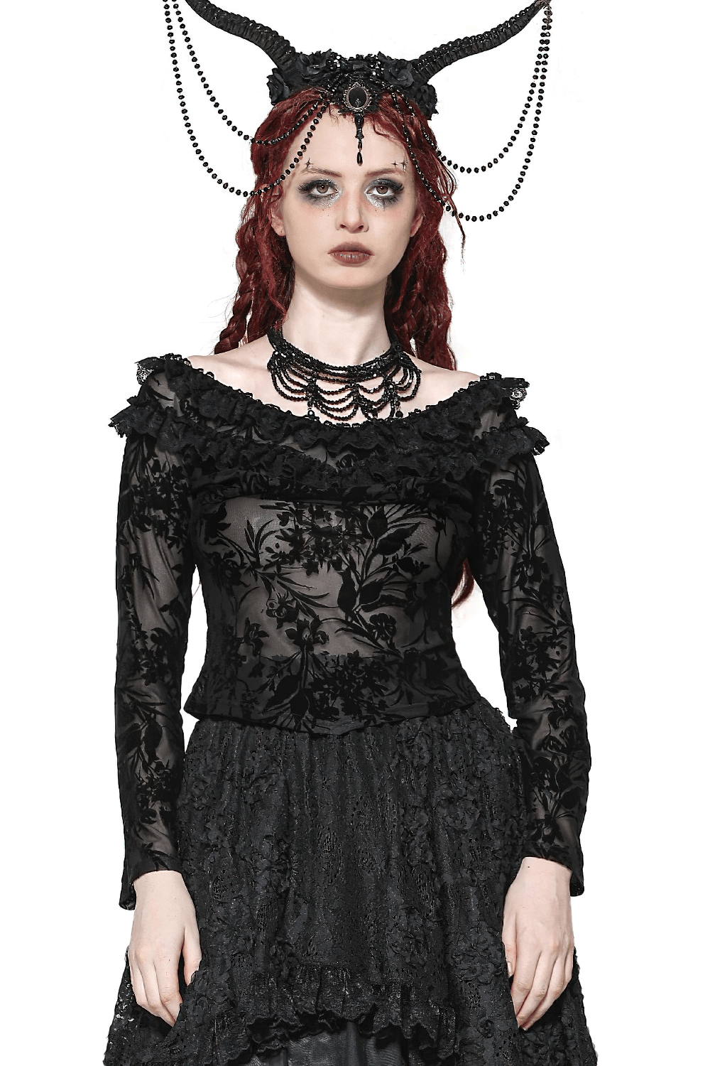 Dark romantic gothic woman in elegant lace floral Bardot top with long sleeves and dramatic black accessories.