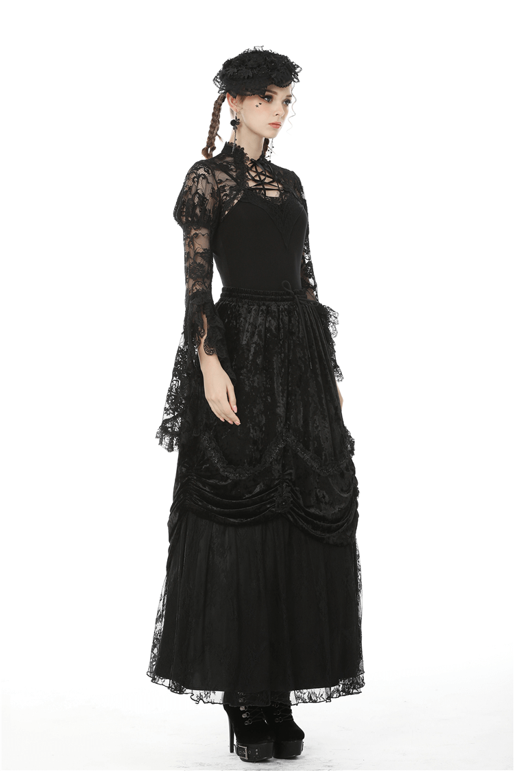 Gothic black lace bolero with long sleeves, layered over a dark dress, showcasing an elegant Victorian-inspired look.