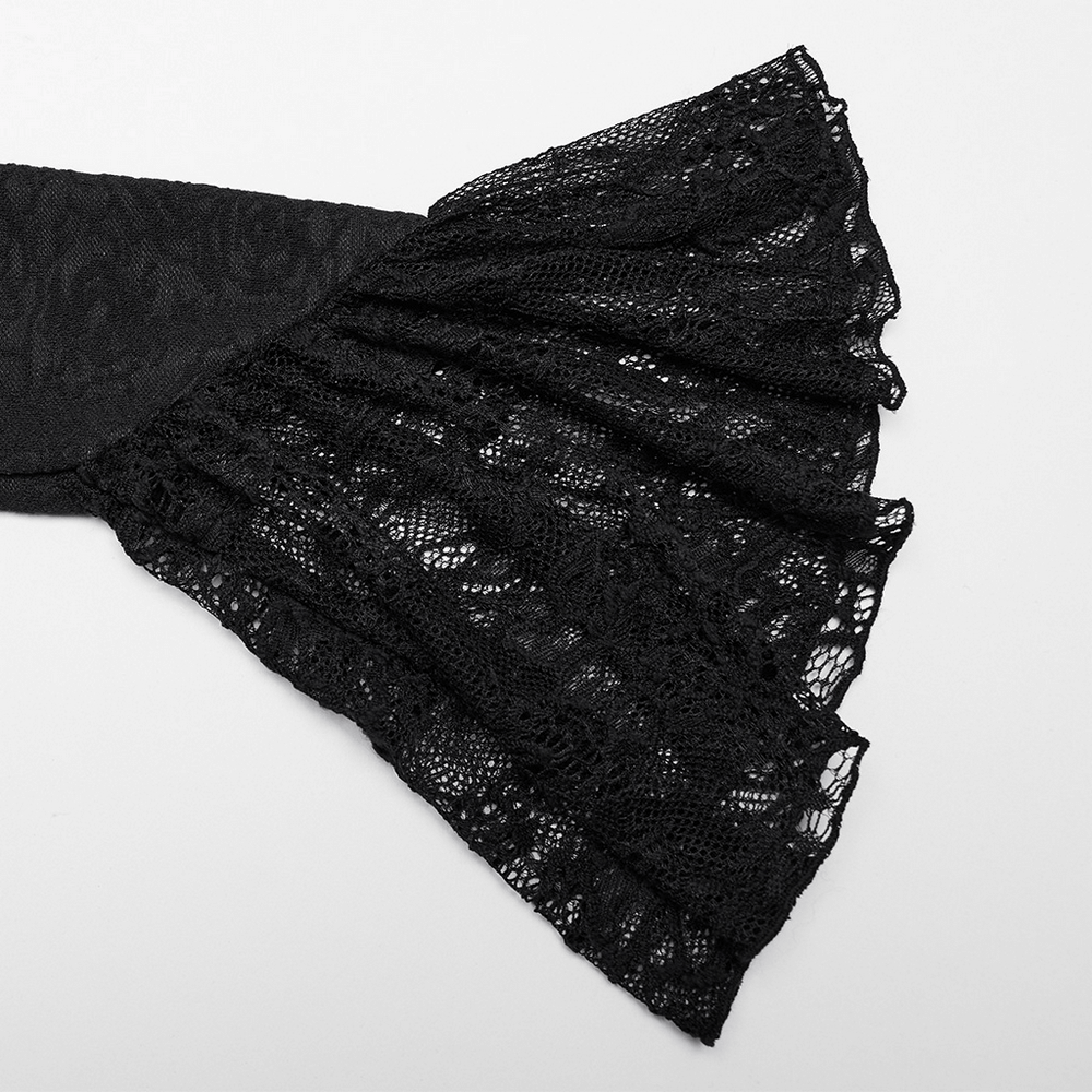 Close-up of the elegant lace ruffle sleeve of a Gothic off-shoulder top, showcasing intricate rose knit design.