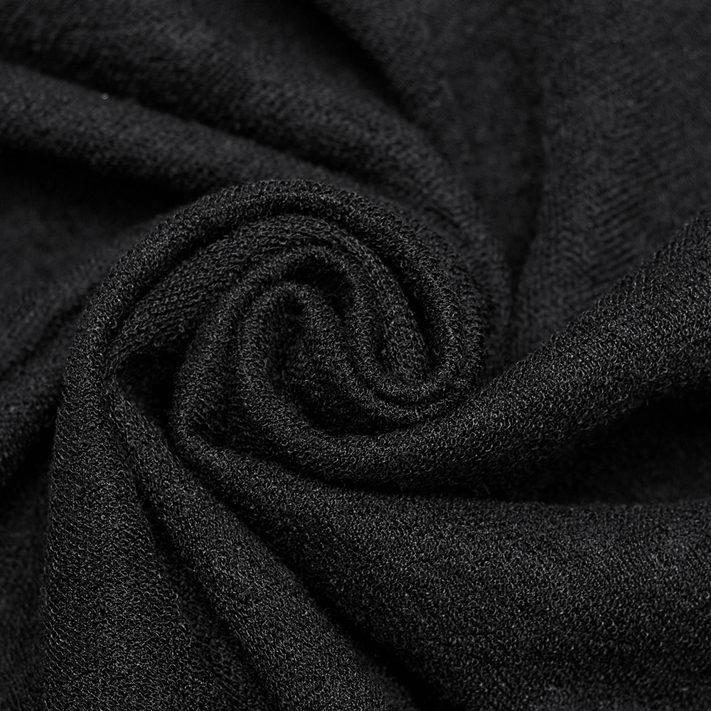 Close-up of soft black fabric showcasing its smooth texture and luxurious feel, perfect for elegant clothing.