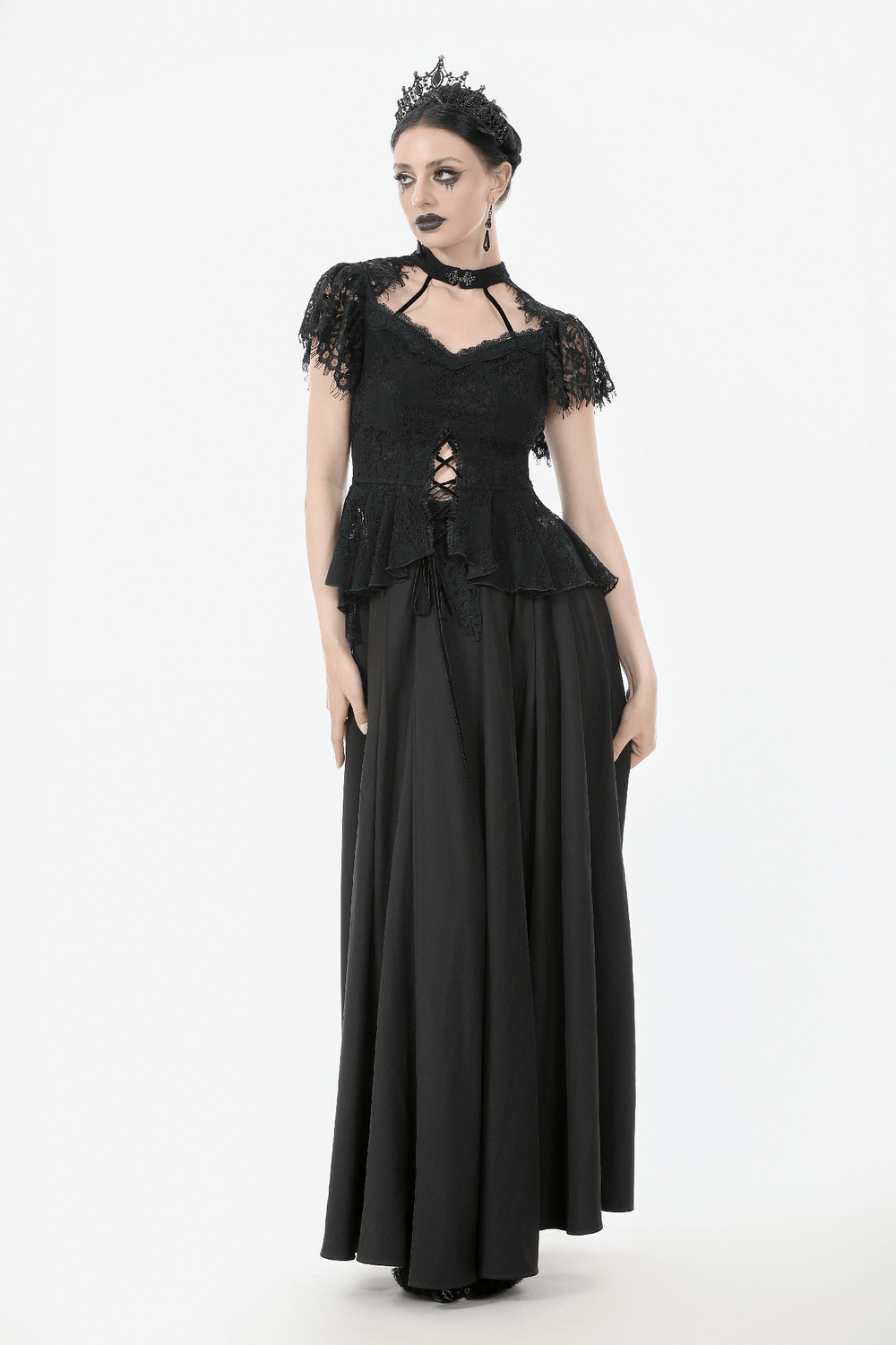 Elegant Lace Peplum Top with Choker Neck and Corset Front worn with a flowing black skirt for a gothic fashion look.