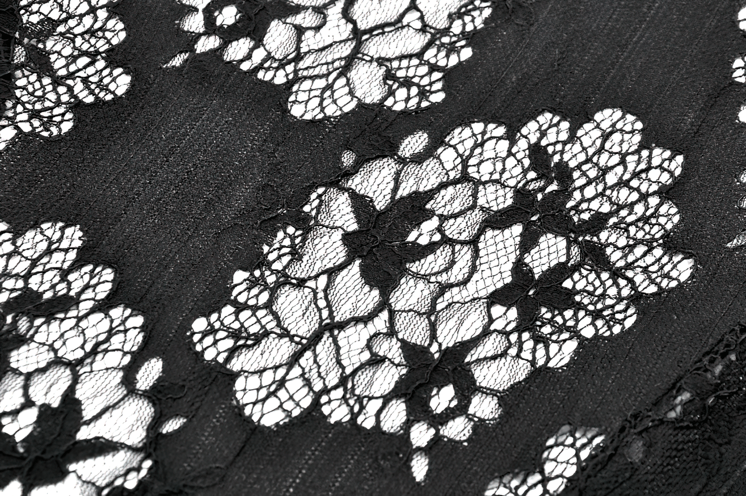 Elegant Lace Peplum Top with Choker Neck and Corset Front featuring intricate floral lace design.