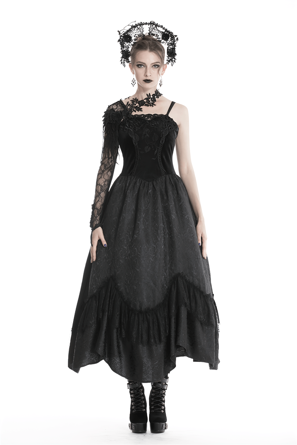 Gothic black dress with elegant lace sleeve accessory and floral appliques, perfect for dark fashion lovers.