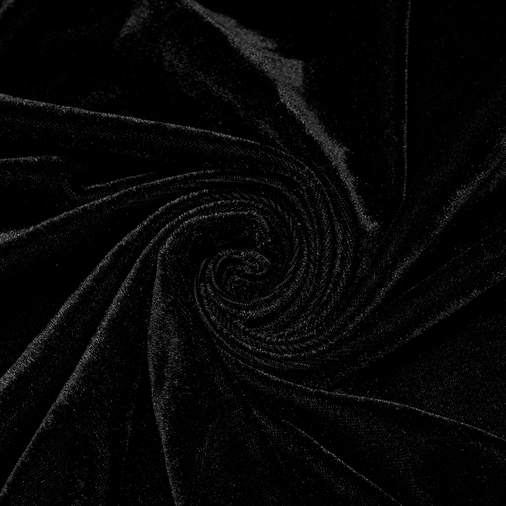 Luxurious black velvet fabric with a soft, smooth texture, perfect for elegant clothing and stylish dresses.
