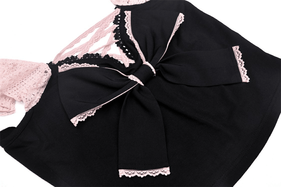 Elegant black crop top with pink lace trim and bow detail, perfect for special occasions.