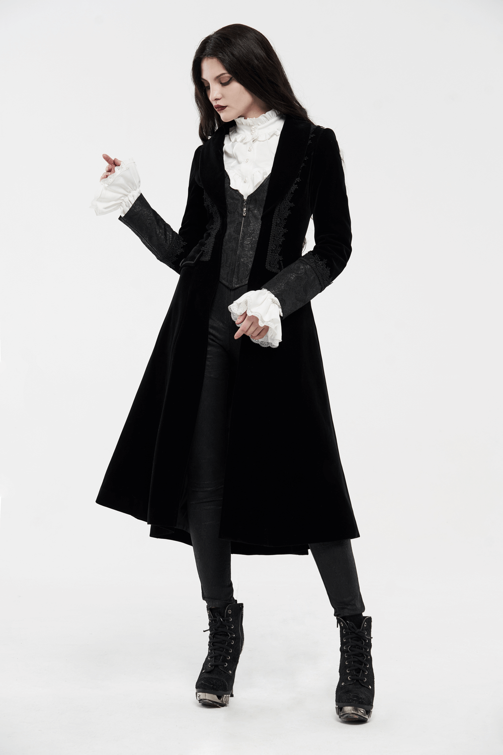 Elegant Gothic long coat with lace trim and chic collar, paired with stylish boots and a sophisticated blouse.