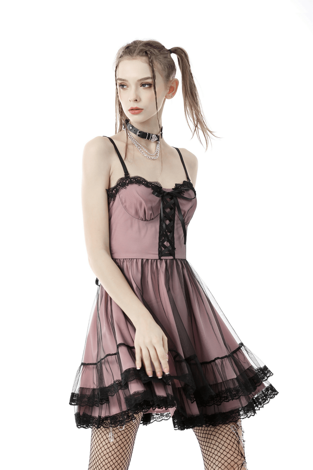 Elegant Lace-Up Dress with Ruffled Hem and Delicate Details