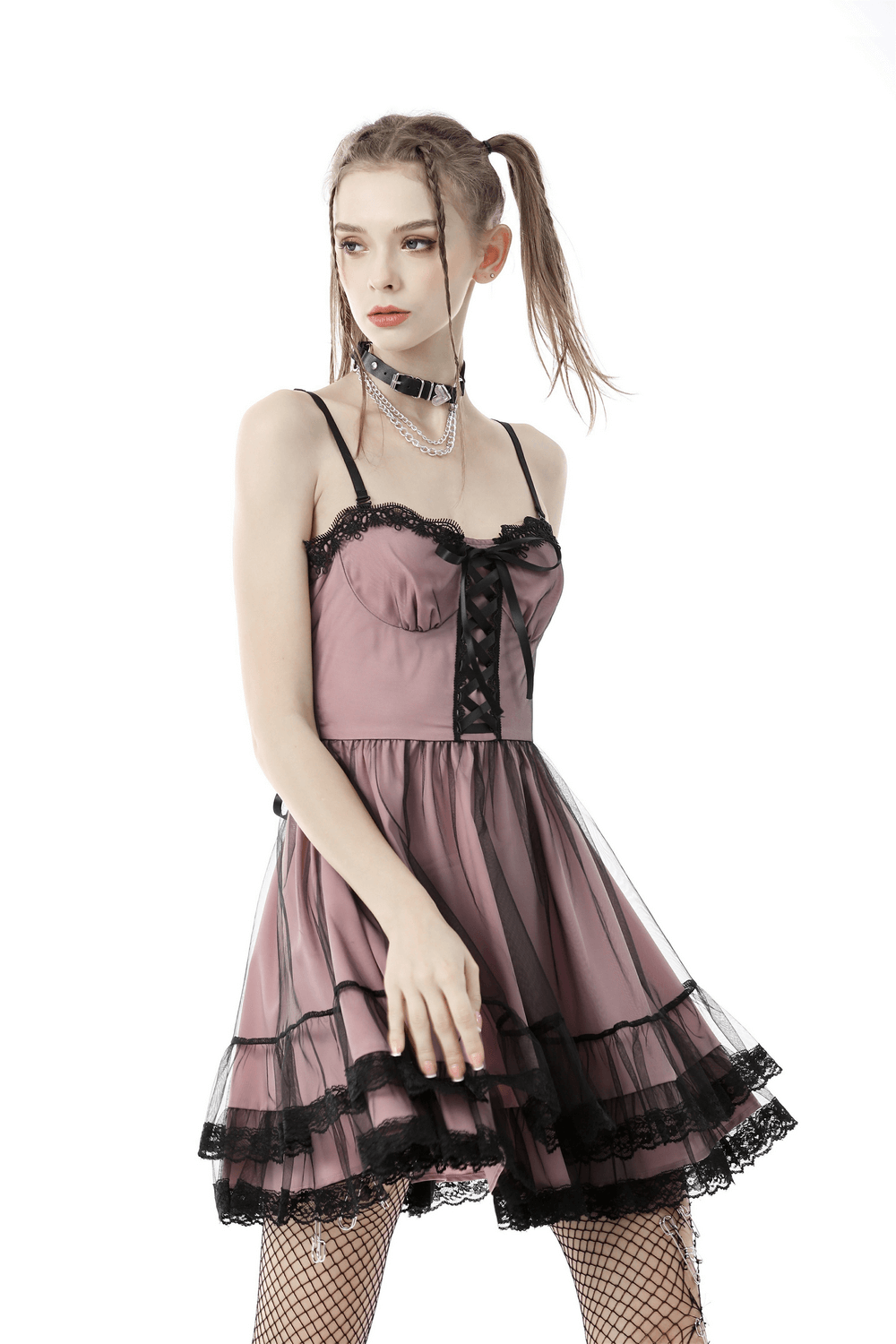 Elegant lace-up gothic mini dress with ruffled hem and black lace accents, perfect for stylish occasions.