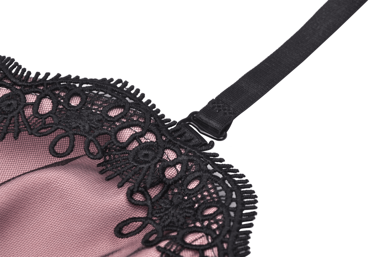 Close-up of elegant black lace detailing on a delicate dress strap, showcasing intricate patterns and textures.