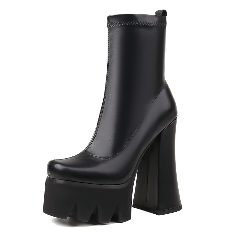 Elegant black leather high-heeled boots with chunky platform for a modern grunge look.