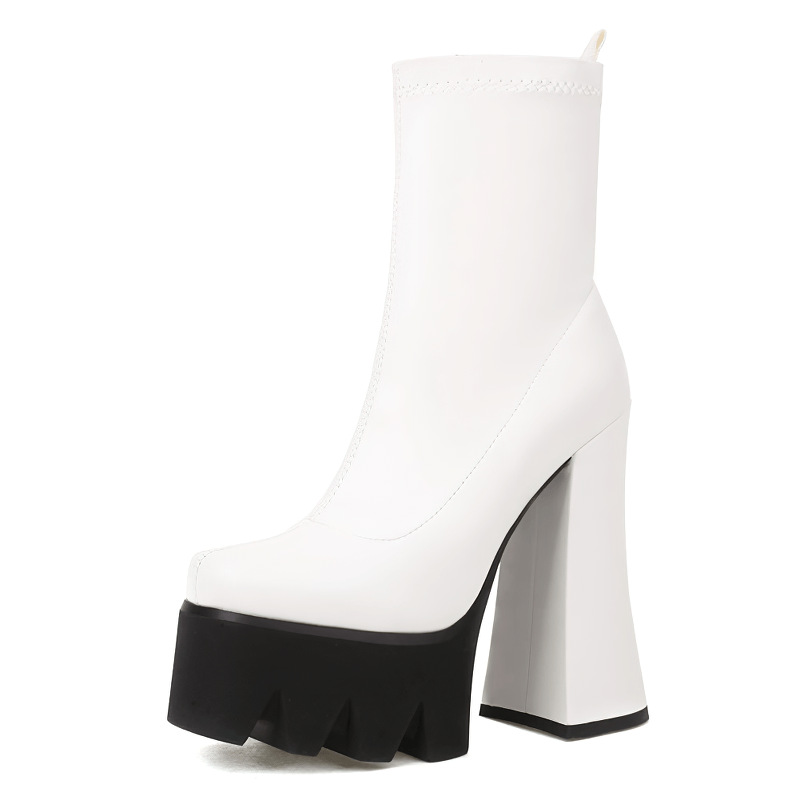 Stylish women's white leather boots with black platform heels, perfect for casual and grunge outfits.