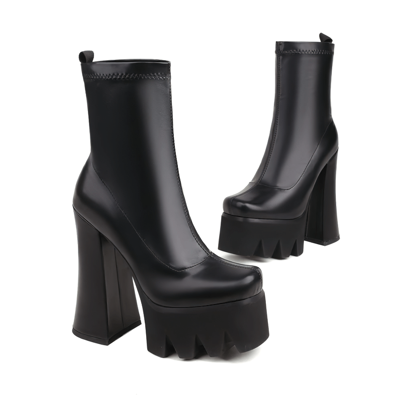 Stylish black leather platform boots for women with high heels and modern design, perfect for casual outfits.