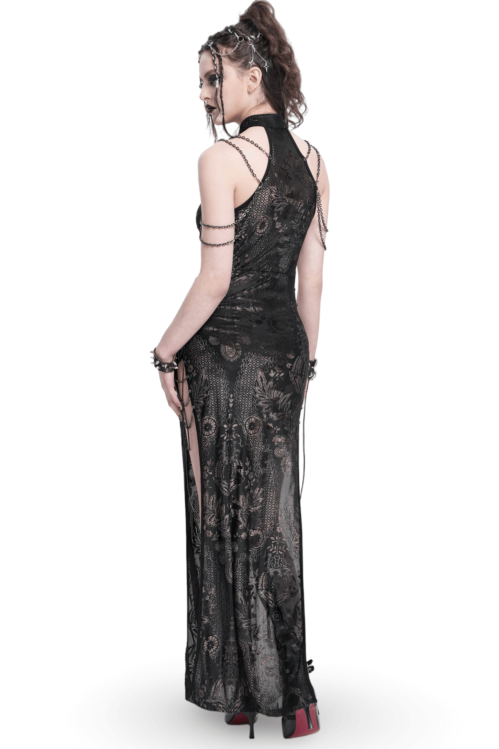 Elegant long gothic lace dress with chains and side slits, showcasing floral embroidery from the back.