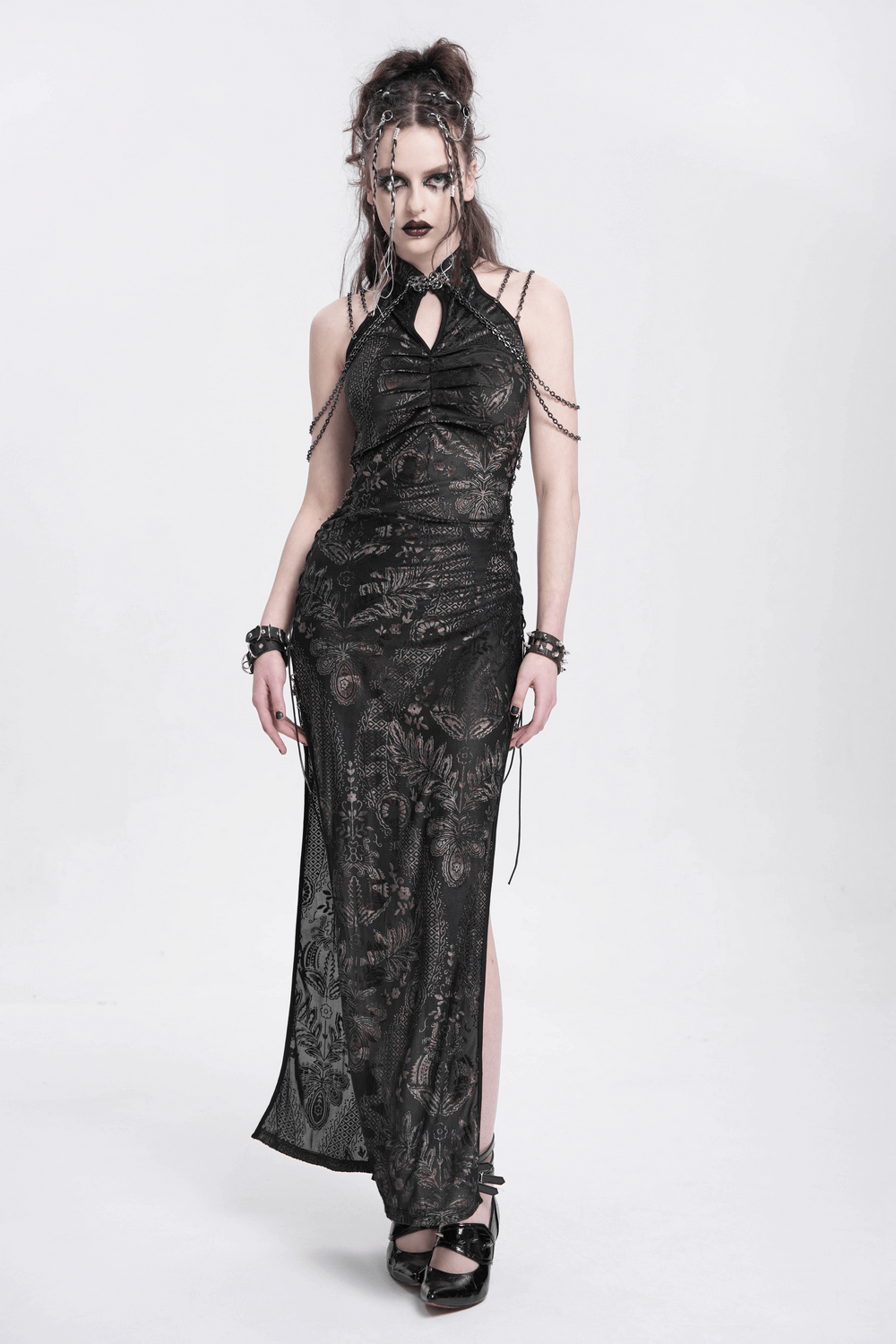 Elegant long gothic lace dress with chain detail, featuring side slits and floral embroidery.