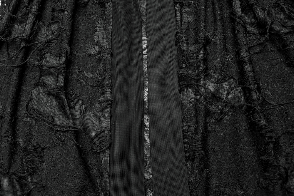 Close-up of the intricate black lace and texture of the gothic coat, highlighting its vintage charm and elegant design.