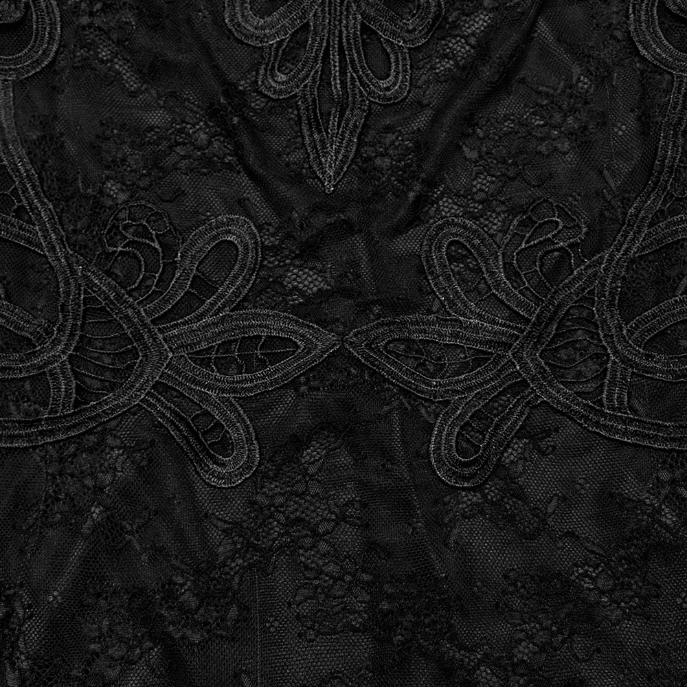 Close-up of intricate black lace and embroidery detailing on the elegant goth formal dress.