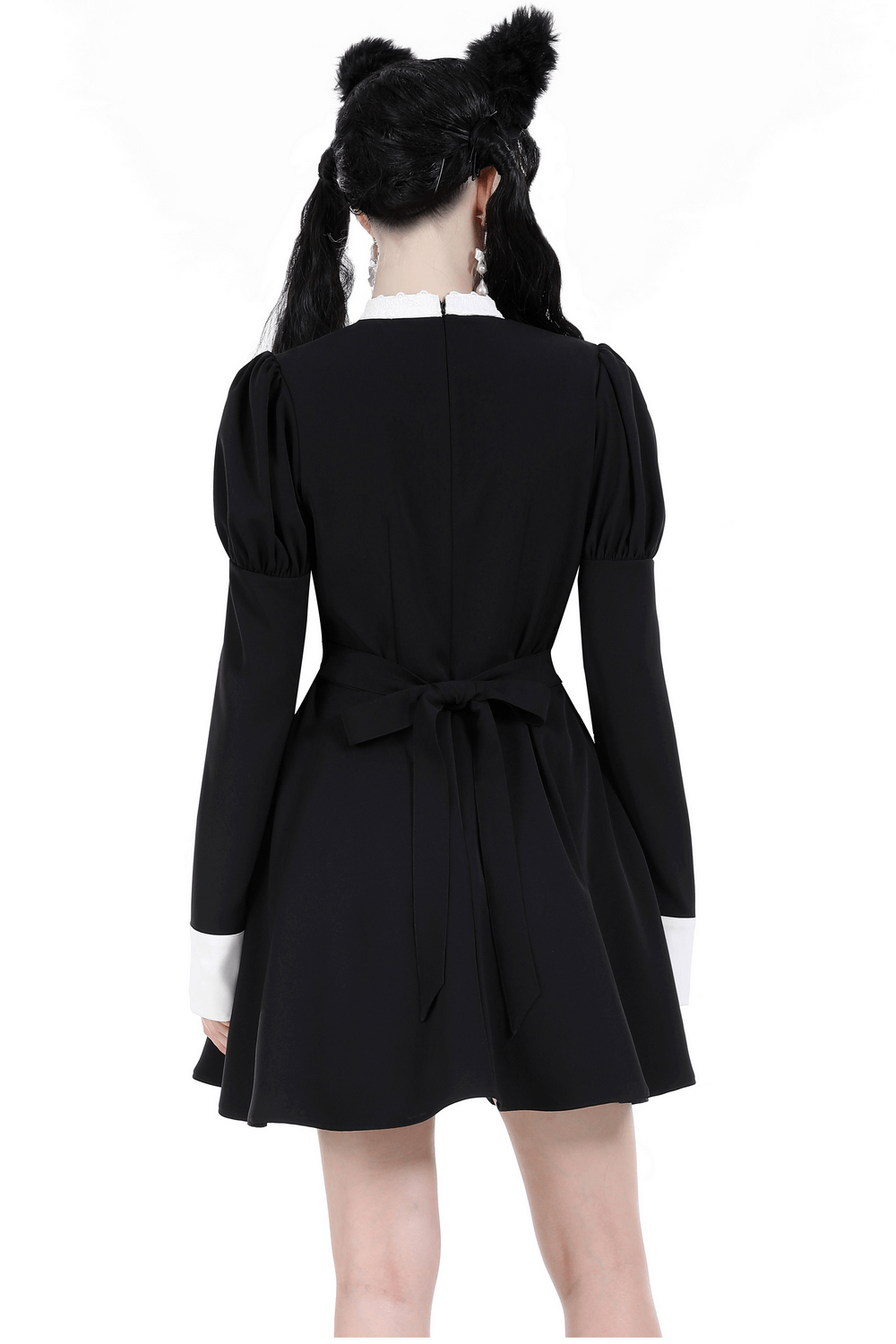 Back view of an elegant long sleeves black dress with white ruffled collar and bow detailing for women.