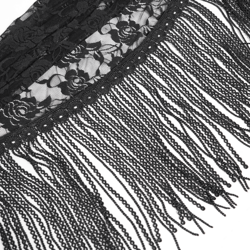 Close-up of elegant black lace and beaded fringe detail, perfect for a stylish maxi dress.