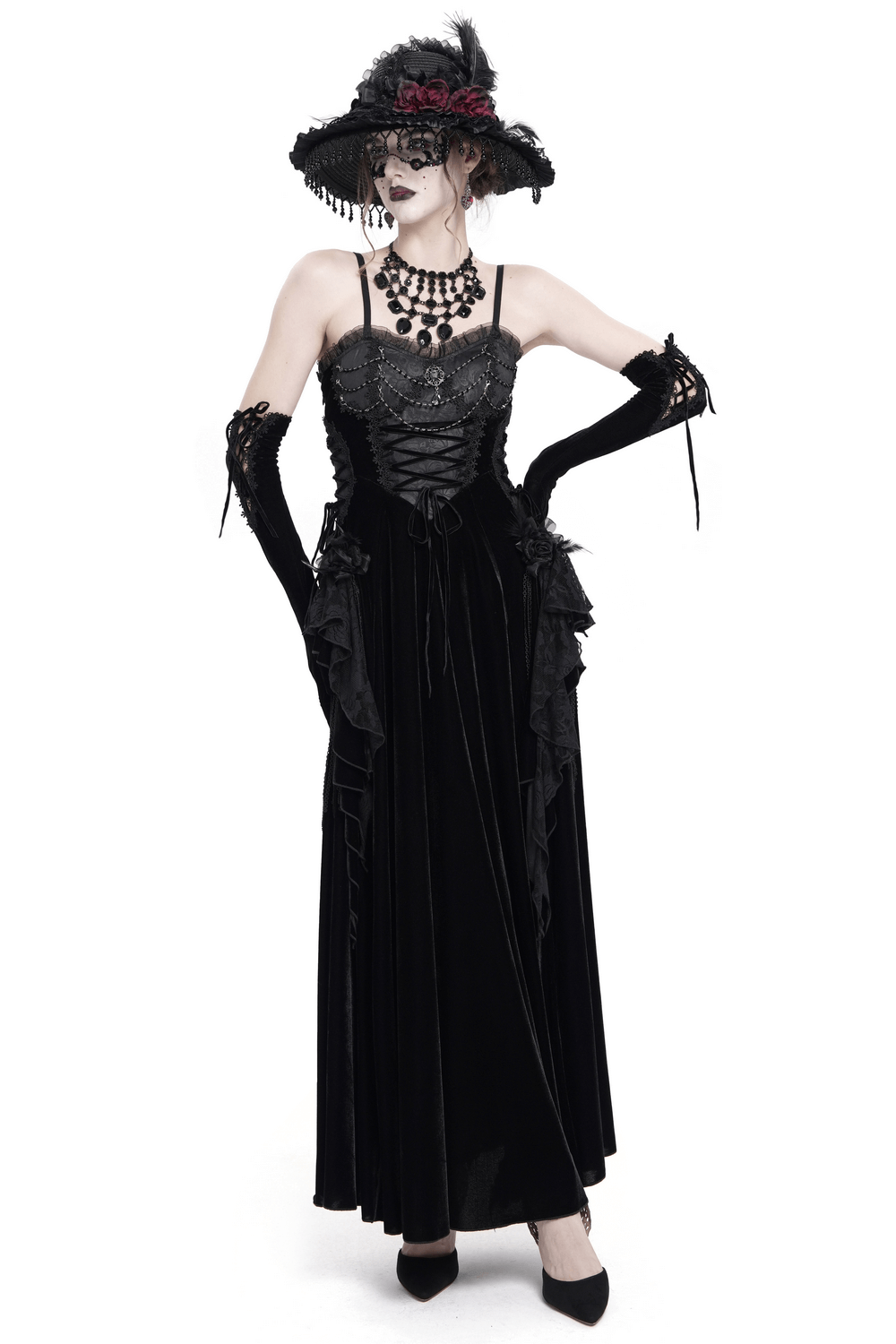 Elegant black maxi dress featuring lace corset, beaded detail, and stylish accessories for a stunning look.