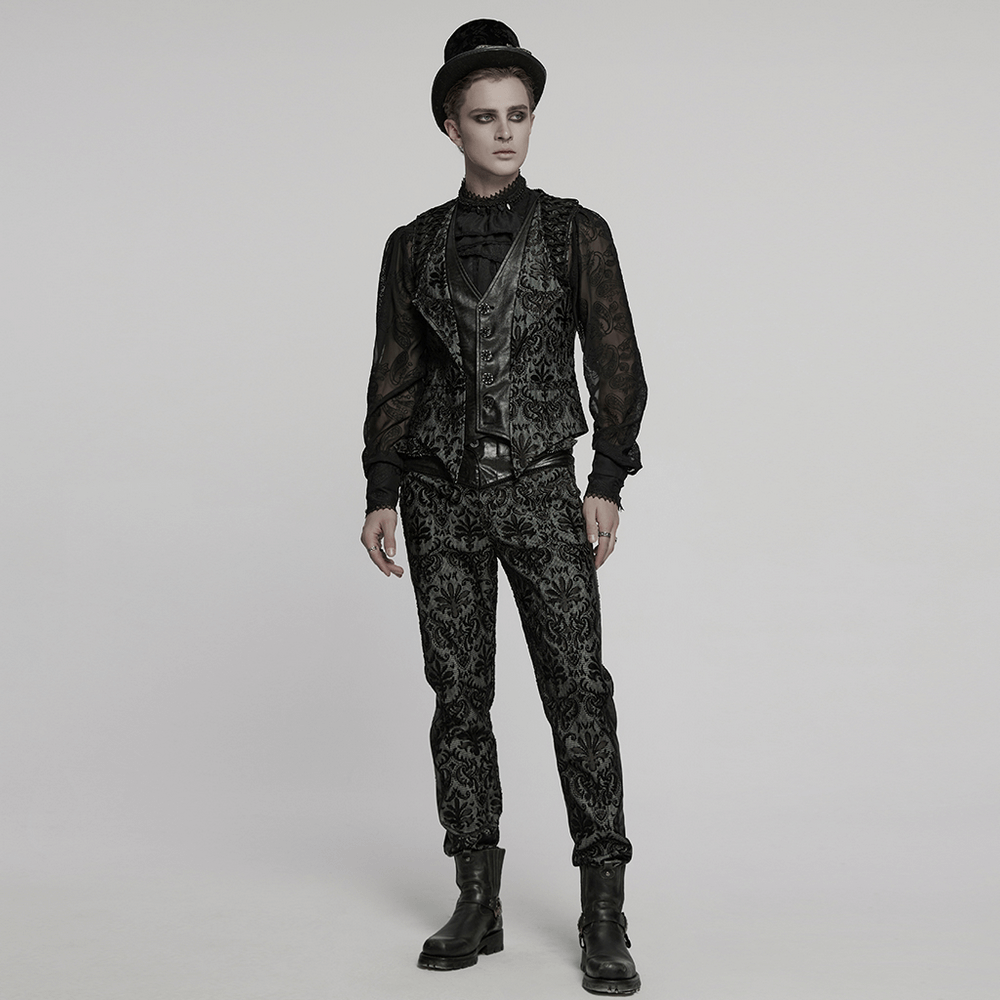 Stylish man in a gothic embroidered brocade waistcoat, paired with ornate dark trousers and accessories.