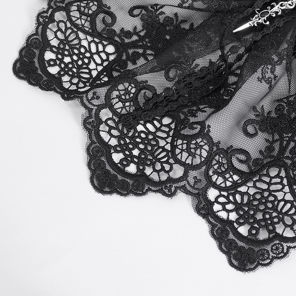 Elegant black lace collar showcasing intricate gothic detailing and a sparkling jewel accent.