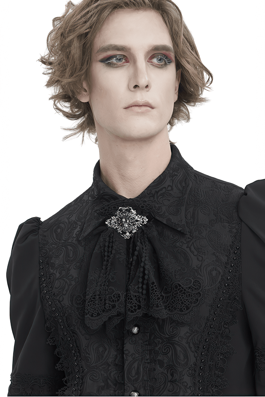 Stylish man in a black Gothic lace collar with jewel brooch, showcasing elegance and dramatic flair.