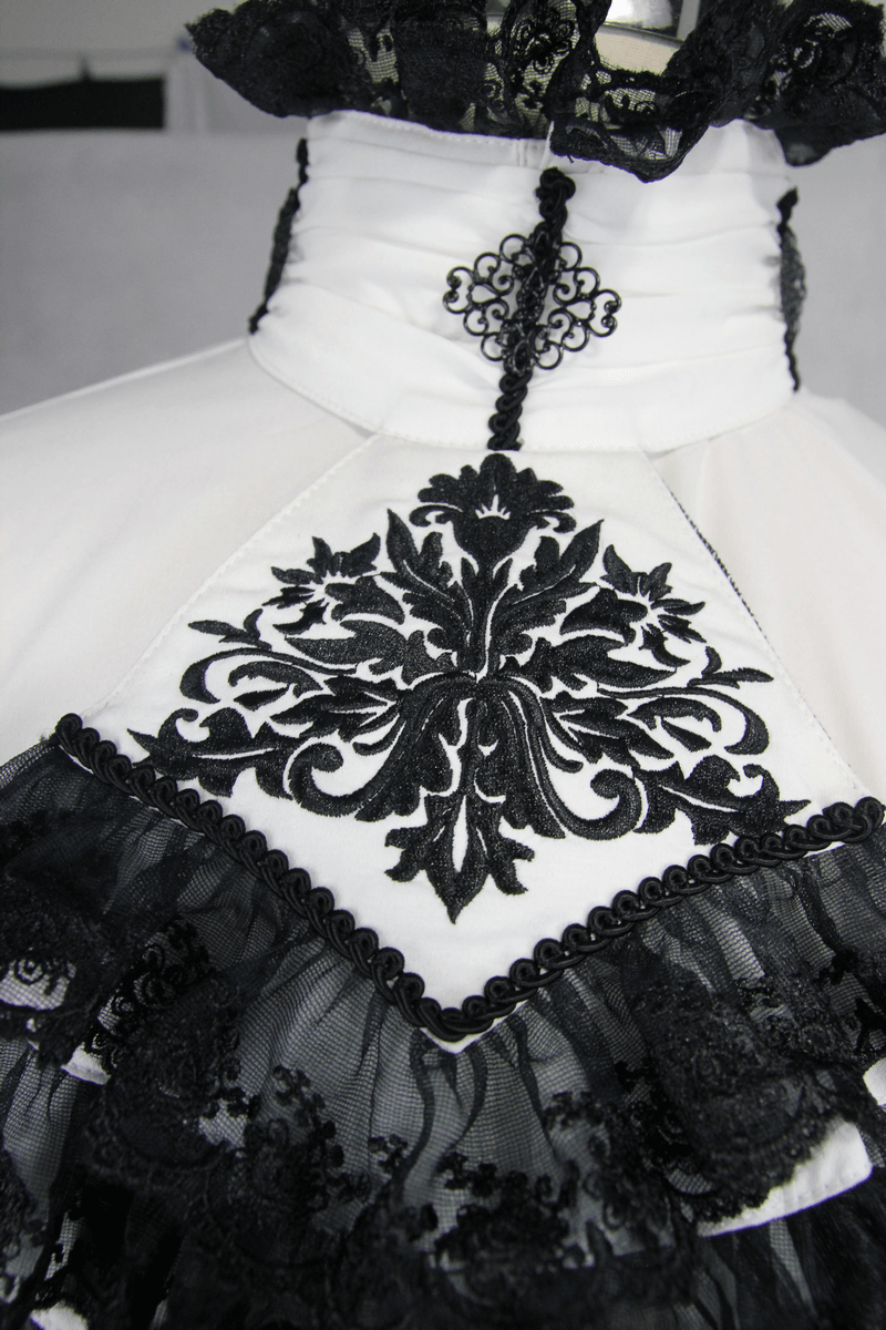 Elegant gothic white shirt with black lace trim and intricate embroidery on stand-collar.
