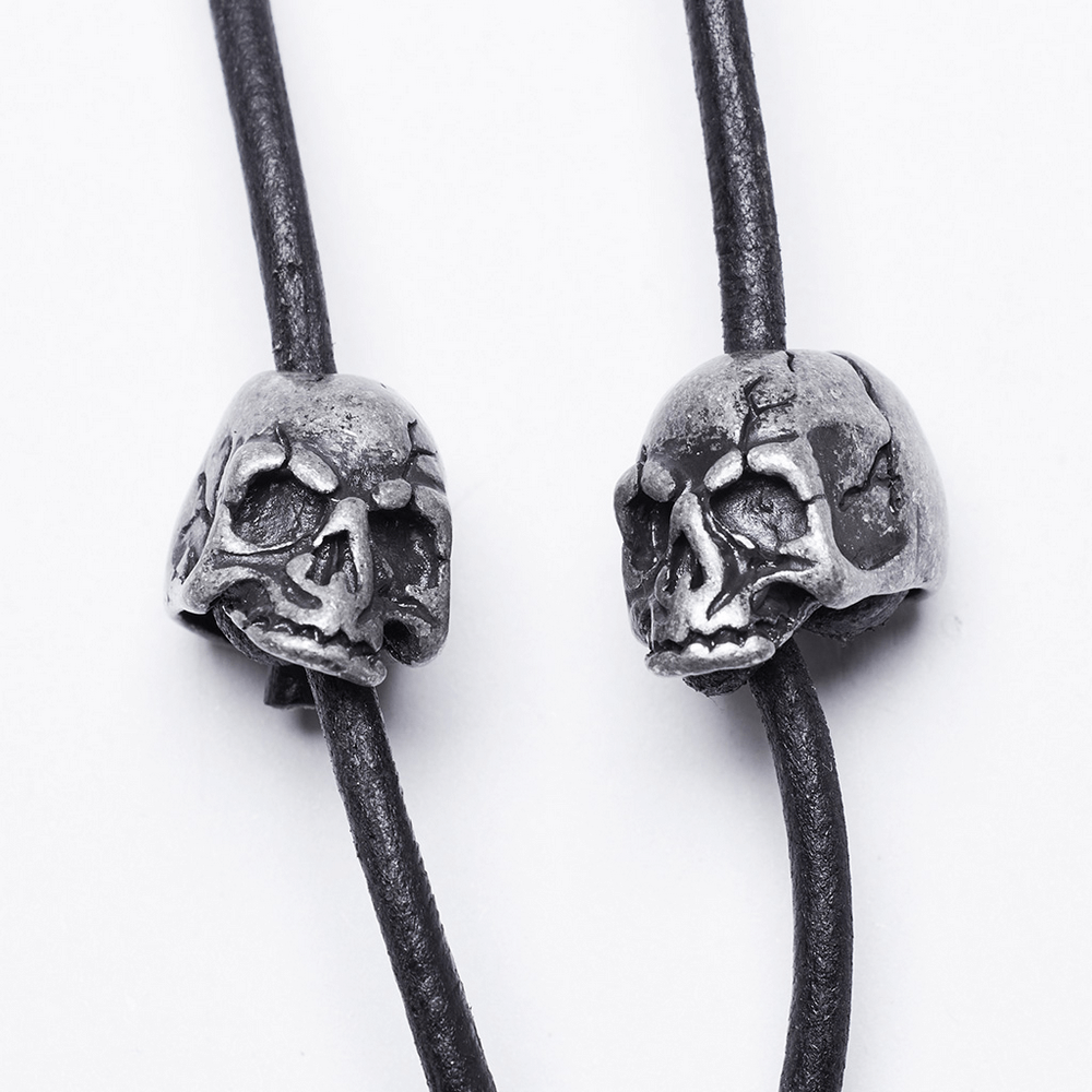 Fashionable black leather cord with silver skull beads, perfect for edgy accessories and unique jewelry designs.