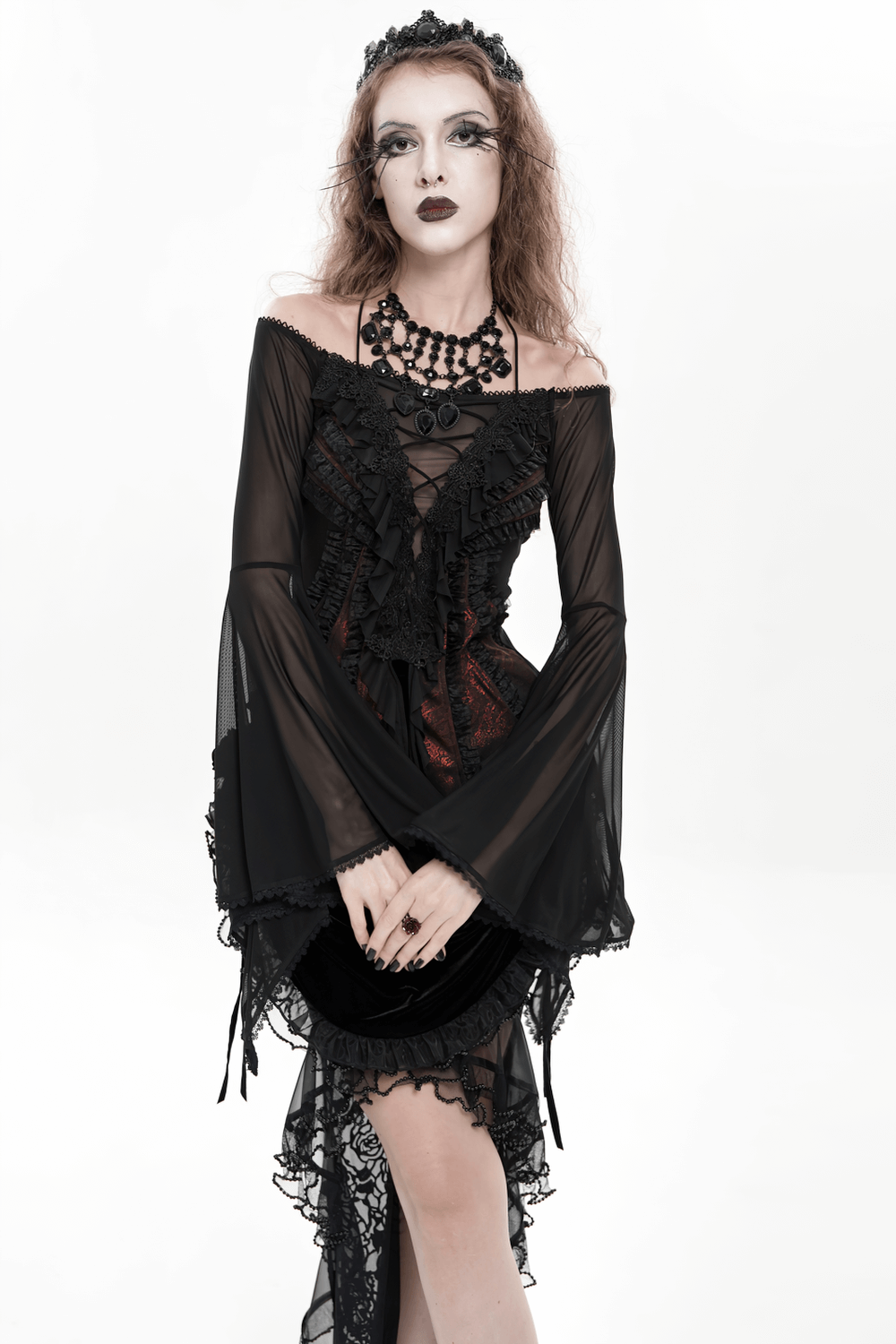 Elegant Off-Shoulder Ruffle Top with Sheer Sleeves and Lace worn by a model showcasing a chic gothic style.