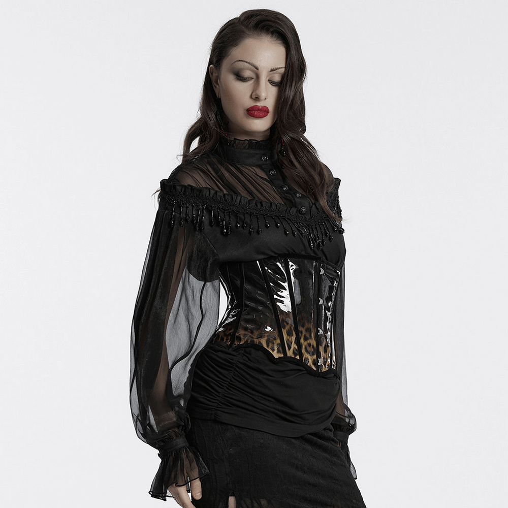 Woman in a black sheer blouse and leopard print patent leather corset showcasing a gothic chic style.