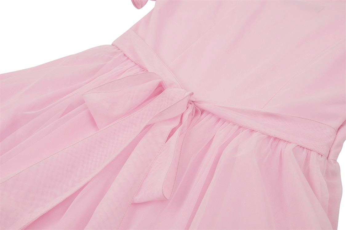 Elegant pink dress with delicate lace detailing and bow, perfect for a chic look at any occasion.
