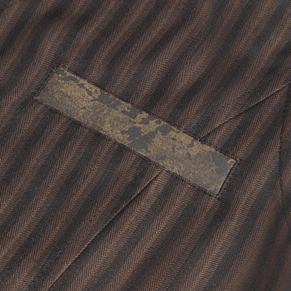 Close-up of the retro pinstriped brown waistcoat showing the unique front pocket detail.