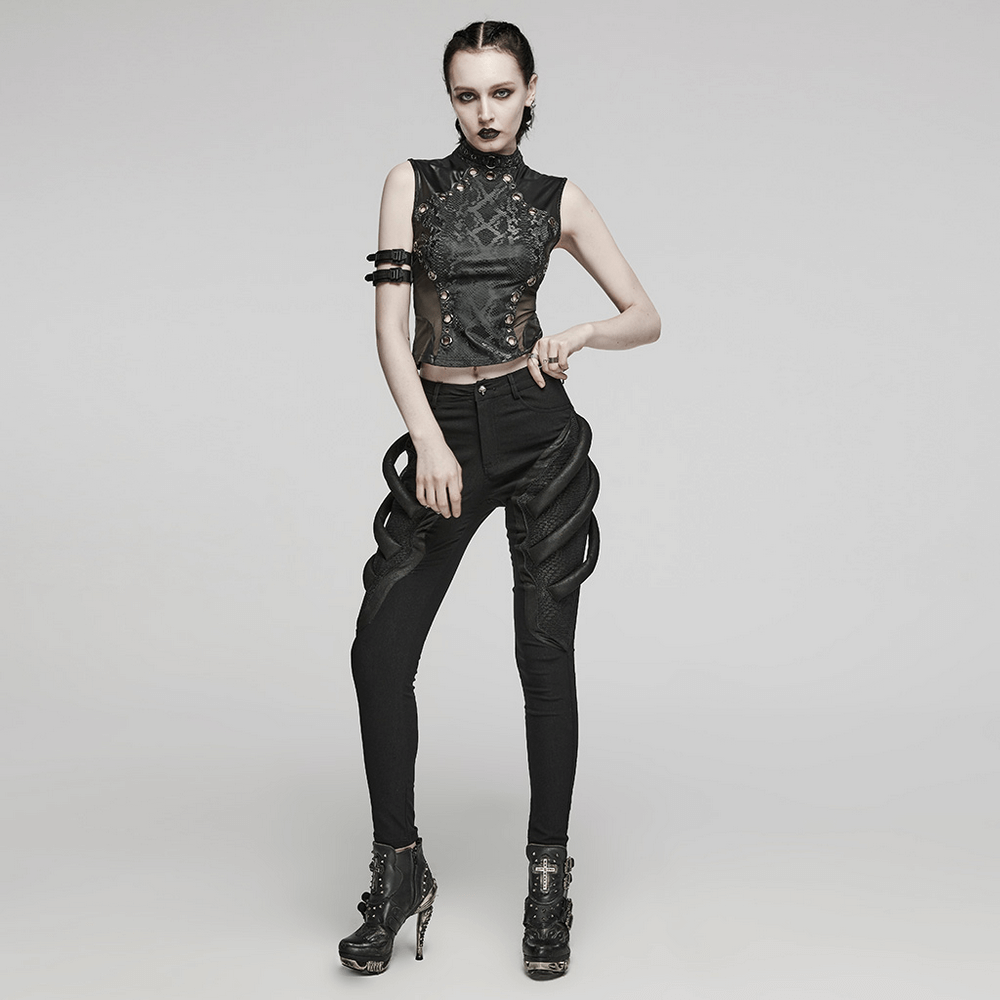 Stylish model wearing an elegant punk black snake print sleeveless top paired with edgy black pants.