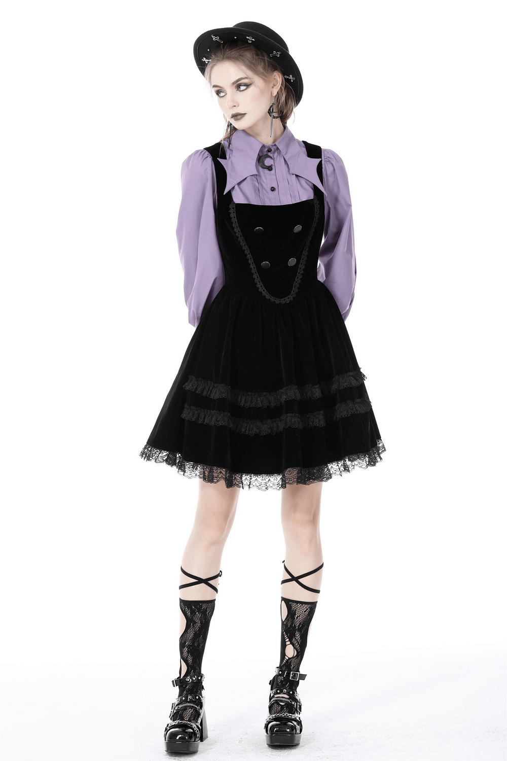 Model in a chic purple blouse with ruffled sleeves, styled with a black dress and lace-up shoes, showcasing Victorian-inspired fashion.