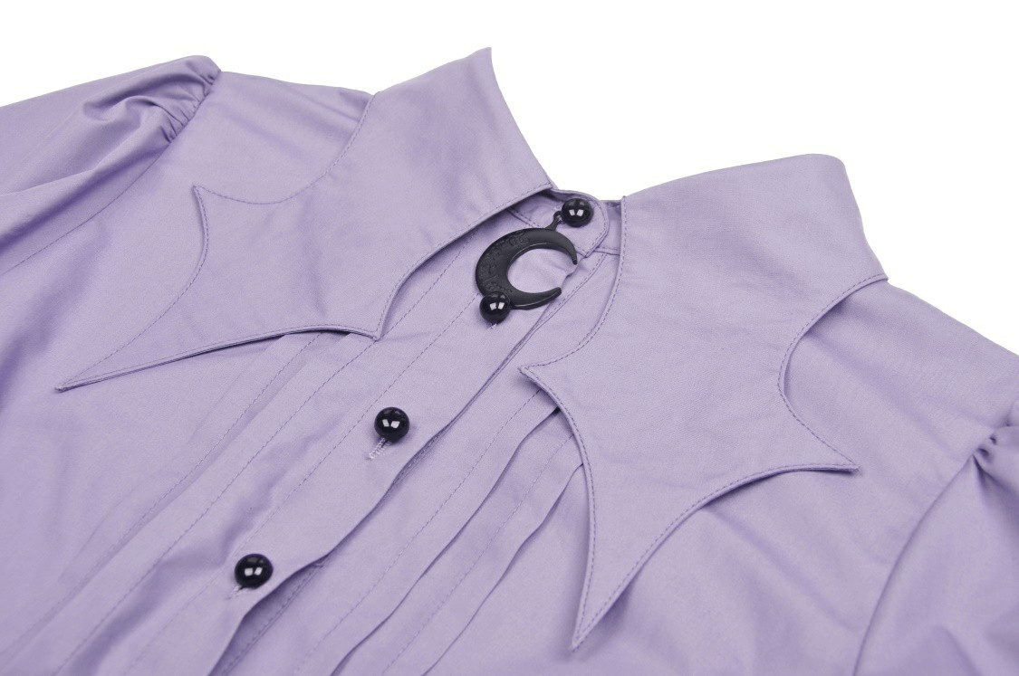Close-up of elegant purple blouse with ruffled sleeves, Victorian-style collar, and button details.