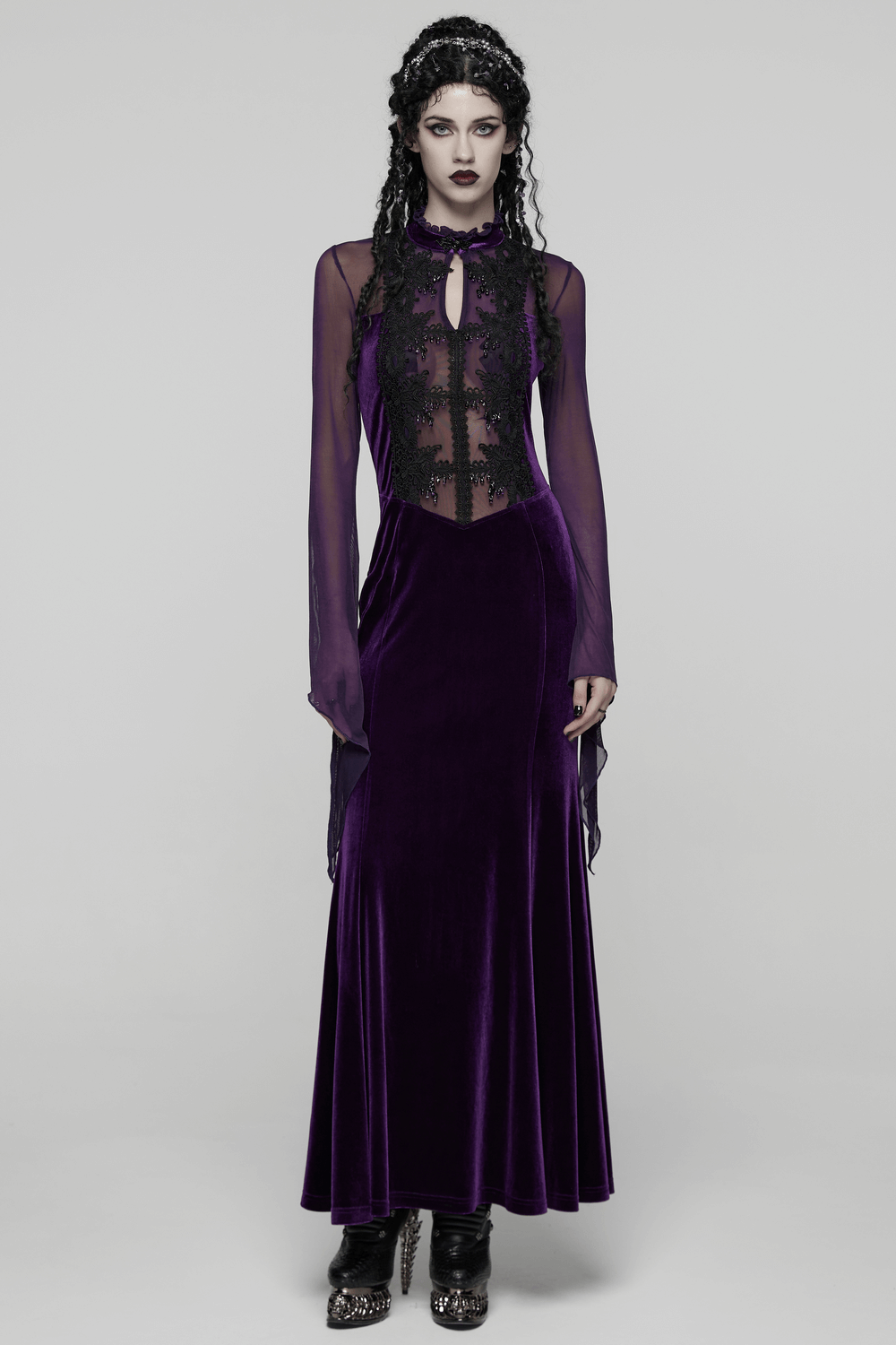 Elegant Purple Velvet Maxi Dress with Lace and Mesh worn by a model, showcasing gothic elegance with lace trim and flowing silhouette.