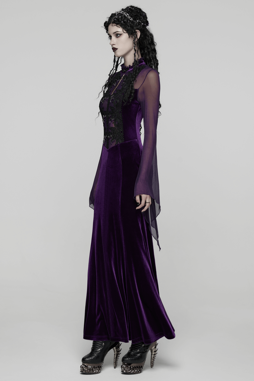 Elegant Purple Velvet Maxi Dress with Lace and Mesh featuring ruffled neckline and elegant glass pendants.