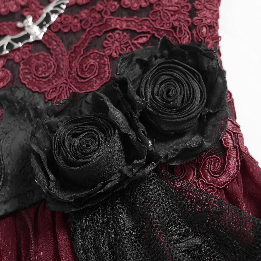 Alt Tag: Elegant Red-Black Gothic Lace Corset Belt with Overskirt close-up of black rose appliques on red embroidered lace