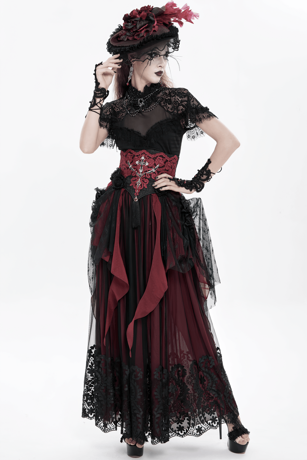 Alt Tag: Elegant Red-Black Gothic Lace Corset Belt with Overskirt on Victorian goth model in black lace top, burgundy skirt, and hat