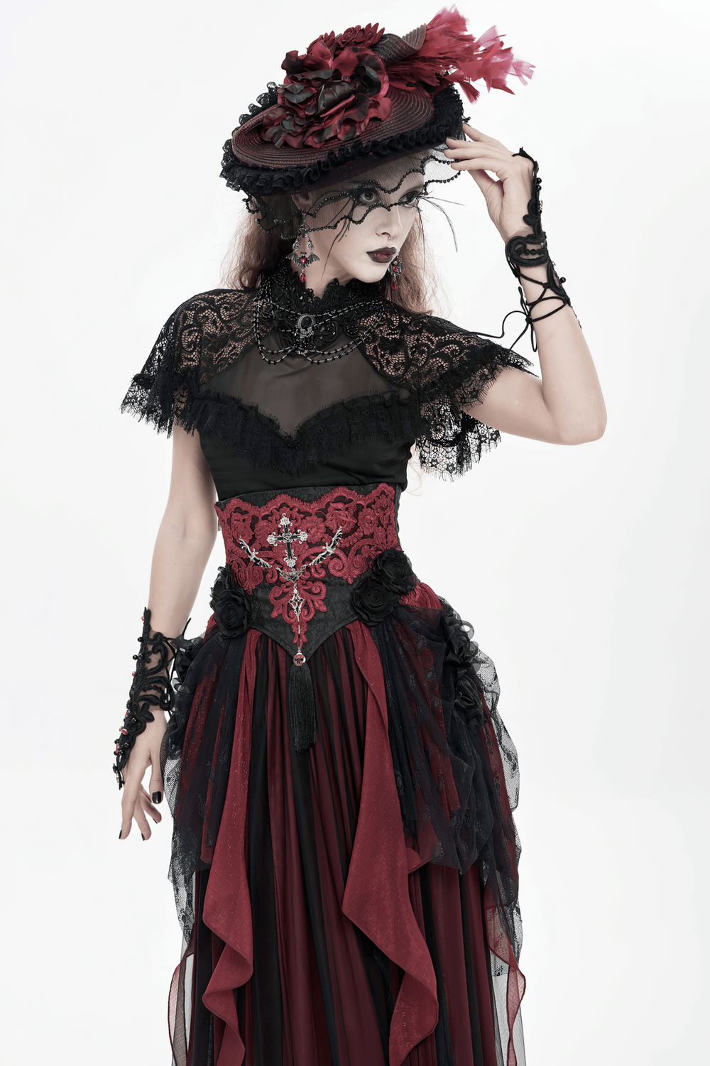 Alt Tag: Elegant Red-Black Gothic Lace Corset Belt with Overskirt worn with Victorian lace dress, red-black train bustle skirt, dramatic gothic look