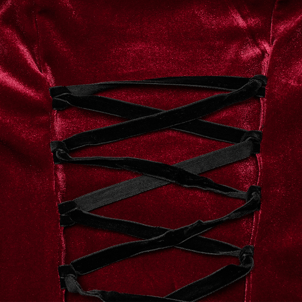 Close-up of lace-up detail on elegant red velvet gothic dress, showcasing luxurious fabric and intricate design.
