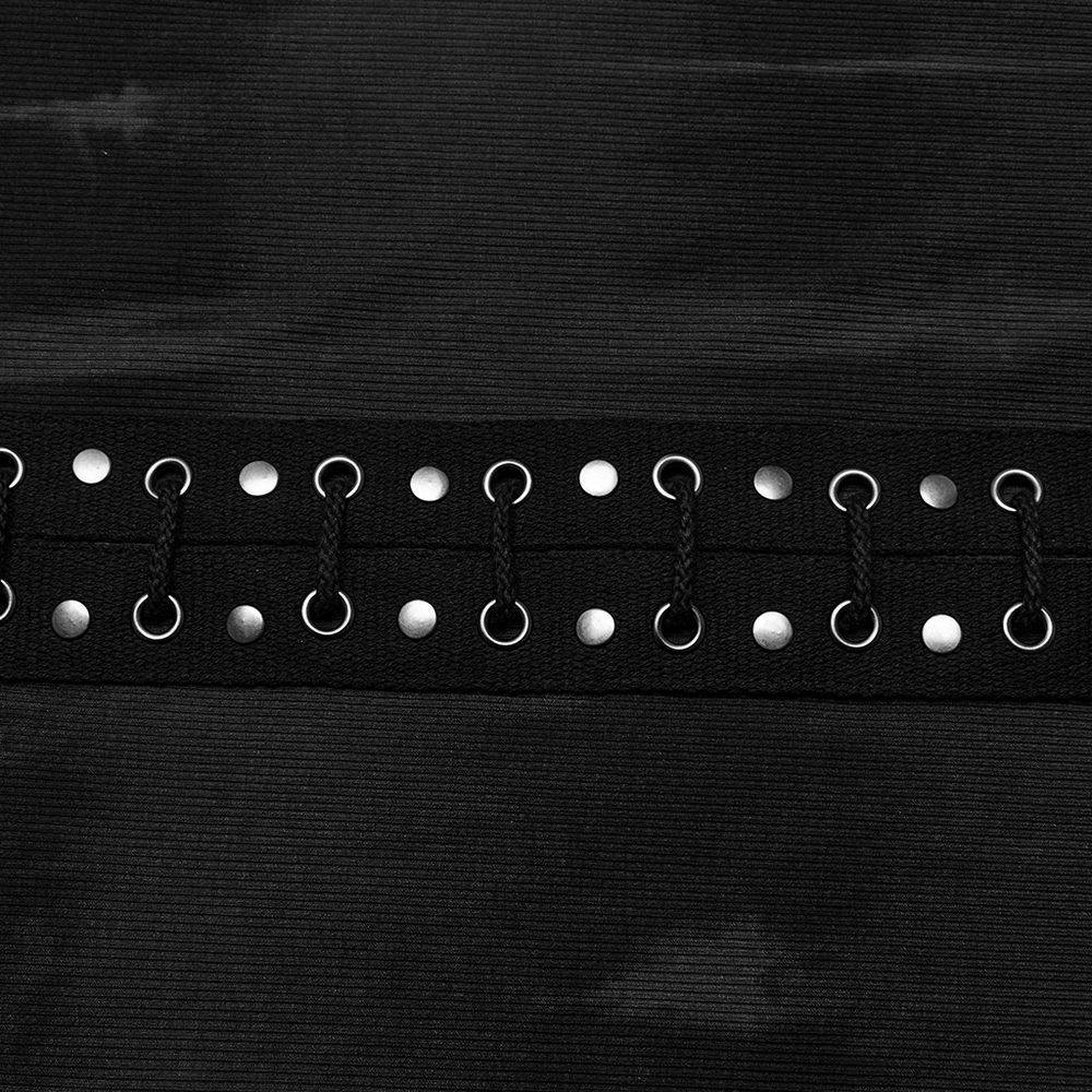 Close-up of elastic ribbed fabric with silver grommets and drawstring detail for a stylish tie-dye tube dress.